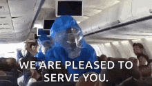 Toxic We Are Pleased To Serve You GIF - Toxic We Are Pleased To Serve You Blue Suit GIFs