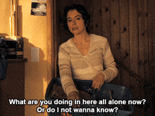 a woman is holding a laundry basket and saying " what are you doing in here all alone now "