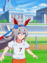 a girl wearing a white shirt with the number 7 on the front