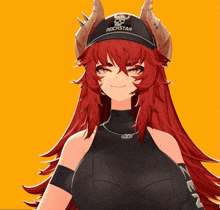 a girl with red hair is wearing a black hat that says rockstar