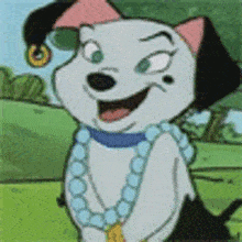 a dalmatian dog wearing a necklace and earrings is sitting on the grass .