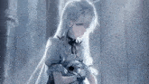 a girl with long white hair is standing in front of a window holding a stuffed animal .
