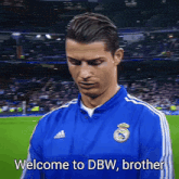 a soccer player says welcome to dbw brother in front of a crowd