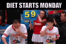 Diet Starts Monday Hot Dog Eating Contest GIF - Diet Starts Monday Hot Dog Eating Contest Nathans GIFs
