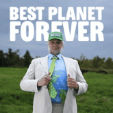 a man in a suit and tie giving a thumbs up in front of a sign that says " best planet forever "