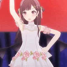 a girl is wearing a white dress with roses on it