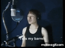 a man singing into a microphone with the words come on a give me water dessert written below him