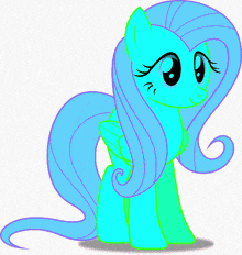 a yellow pony with a long orange mane and green eyes