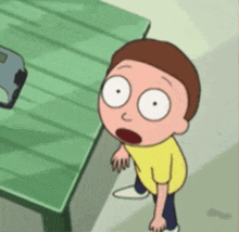 a cartoon character is standing in front of a green table .
