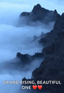 a picture of a mountain with the words grand rising beautiful one on it