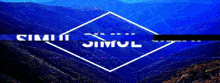 a picture of a mountain range with the words simul written in white