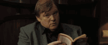 Serious Stare GIF - Serious Stare Book Drop GIFs