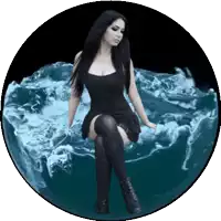a woman in a black dress sits on a globe