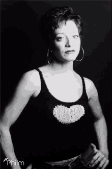 a black and white photo of a woman with philm written below her