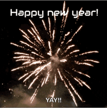 a fireworks display with the words happy new year yay on the bottom