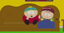 two south park characters sit on a couch