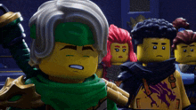a group of lego ninjago characters are standing in a room