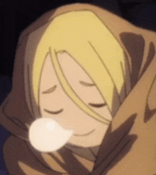 a close up of a cartoon character wrapped in a blanket with a light bulb in his mouth .