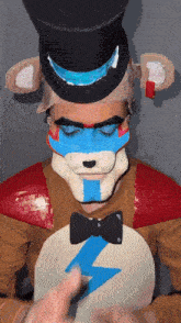a person in a teddy bear costume has a lightning bolt on their chest