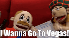 a puppet says i wanna go to vegas while another puppet holds a ticket