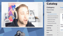 a man wearing headphones is looking at the catalog