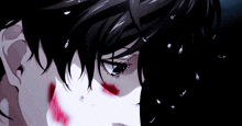 a close up of a person 's face with blood coming out of their mouth