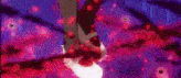 a person in a blue jacket and black pants is standing in a dark room with bullet holes in his pants .