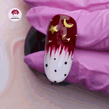 a close up of a nail with a sticker that says nails inspiration