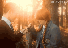 a boy and a girl are standing next to each other with the hashtag #crypttv