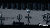 a blurred image of a field with a flixier logo in the lower right corner