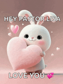 a stuffed bunny holding a pink heart with the words hey pastor lisa love you below it