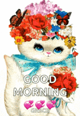 a cat with flowers on its head and the words good morning written below it