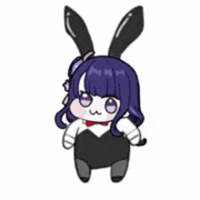 a cartoon girl with purple hair and bunny ears is being held by a person 's hand .