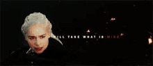 a close up of a woman 's face with the words `` i will take what is mine '' in the background .