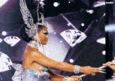 a woman in a fancy dress is holding a pair of scissors in front of a screen that says tumblr