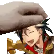 a person is putting a towel on top of a person 's head .