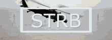 a picture of a helicopter flying over a field with the word strb above it