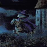 a frog wearing a witch hat is riding a horse .