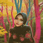 a painting of a woman wearing a hijab in front of trees