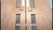 a wooden door with the words hello chat on it