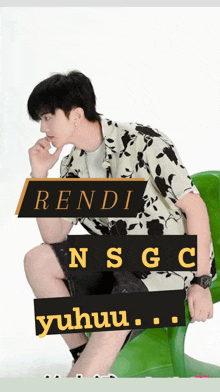 a man sitting on a green chair with the words " rendi nsgc yuhuu " on the bottom
