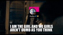 a woman holds a piece of paper in front of her face with vladlen on it