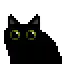 a black cat with green eyes and a pink tongue sticking out