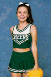 a cheerleader wearing a green cheers uniform