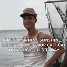 a man wearing a hat and a tank top is standing in front of a boat in the water .