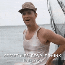 a man in a hat and tank top says sometimes people think im slow