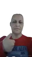 a woman giving a thumbs up wearing a shirt that says walk alone 95