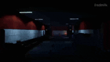a dark room with red lights and the words fredmilk on the bottom right