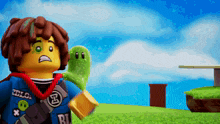 a lego character has a patch on his shirt that says " ninjago "