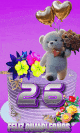 a teddy bear is holding a heart on top of a birthday cake